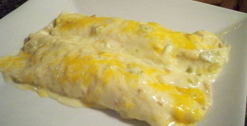 Chicken Enchiladas is an awesome dish, and this recipe is a bit unique.  A super creamy and flavorful white sauce is makes these enchiladas so special.