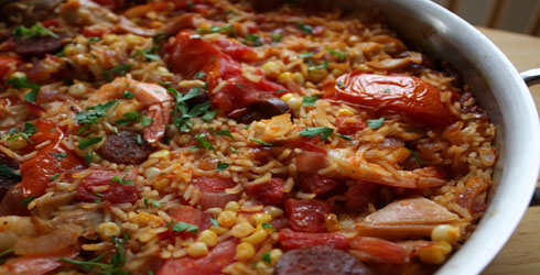 Chicken Paella is a Spanish dish that is full or flavor, and made easy by using a rotisserie chicken.