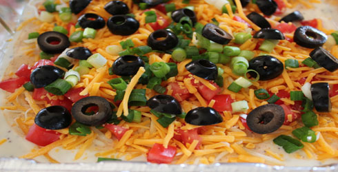Taco Dip is a simple and delicious appetizer that is perfect for parties.  With lots of yummy flavor that all guests are sure to love.