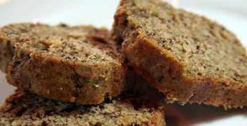 Zucchini Bread Recipe: Moist and delicious.  Perfect when company stops over and to give as a little housewarming gift.  This is a wonderful homemade treat!