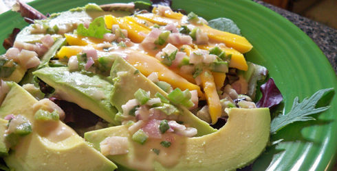 Mango and Avocado Salad with Peanut Dressing is something you will want to eat nearly every day.  This salad can be served as a starter dish or pile it up to make a super refreshing lunch to get you through the hot days.