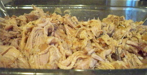 North Carolina Pulled Pork comes out super tender and juicy, with a tartness that only a vinegar based sauce will provide.  Using a crock pot makes this dish a snap.